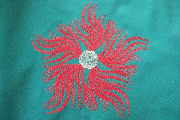 Swirl Flower: A Versatile Design for Seasonal Embroidery